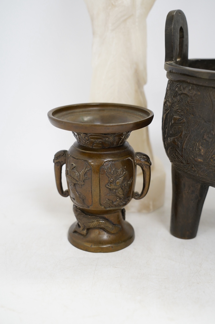 A Chinese alabaster carved model of an elder, a Chinese bronze tripod censer and a Japanese bronze vase, tallest 45cm. Condition - fair